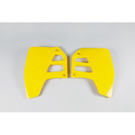 Plásticos laterales de radiador UFO Suzuki amarillo SU02909-101